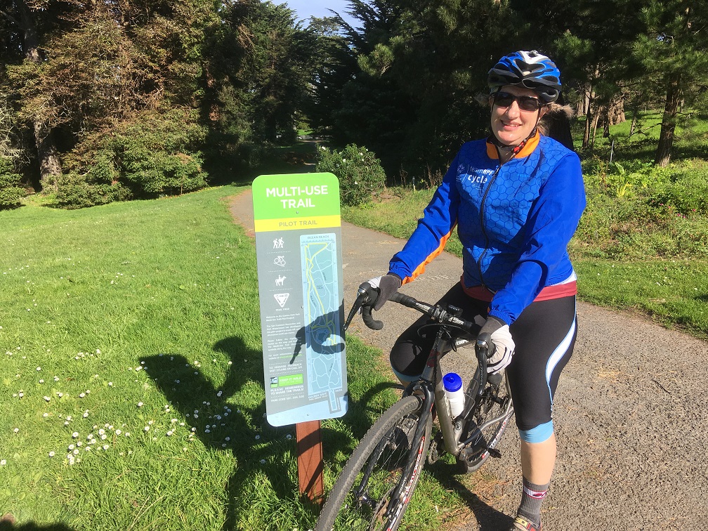 Image of GGP Pilot Sign and trail and bicyclist